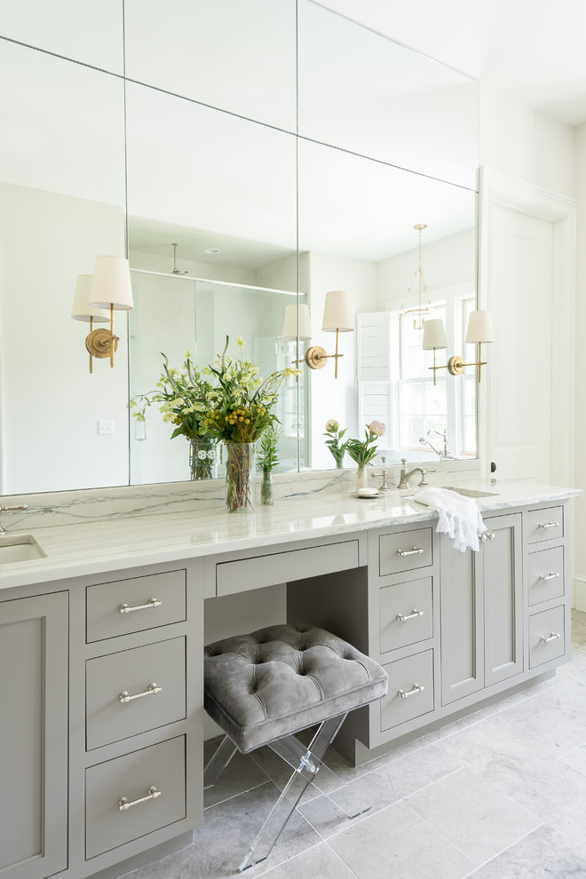 Transitional master bathroom in Nashville with grey cabinets, an undermount sink, grey floor and marble benchtops.