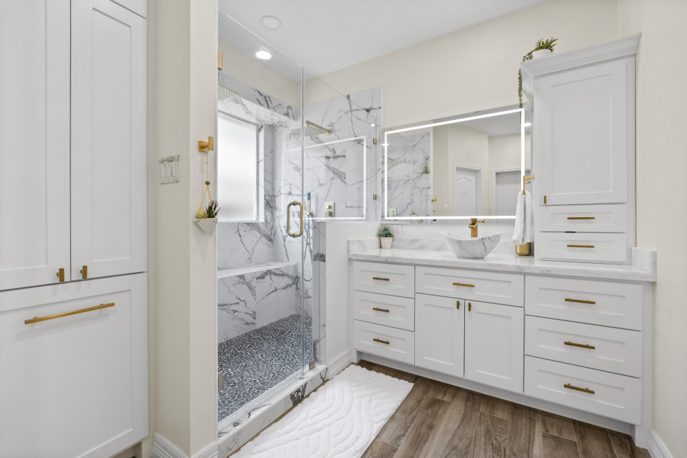 Design ideas for a medium sized modern ensuite bathroom in Houston with shaker cabinets, white cabinets, a double shower, a bidet, white tiles, porcelain tiles, beige walls, porcelain flooring, a vessel sink, quartz worktops, brown floors, a hinged door, white worktops, a shower bench, double sinks, a built in vanity unit and a coffered ceiling.