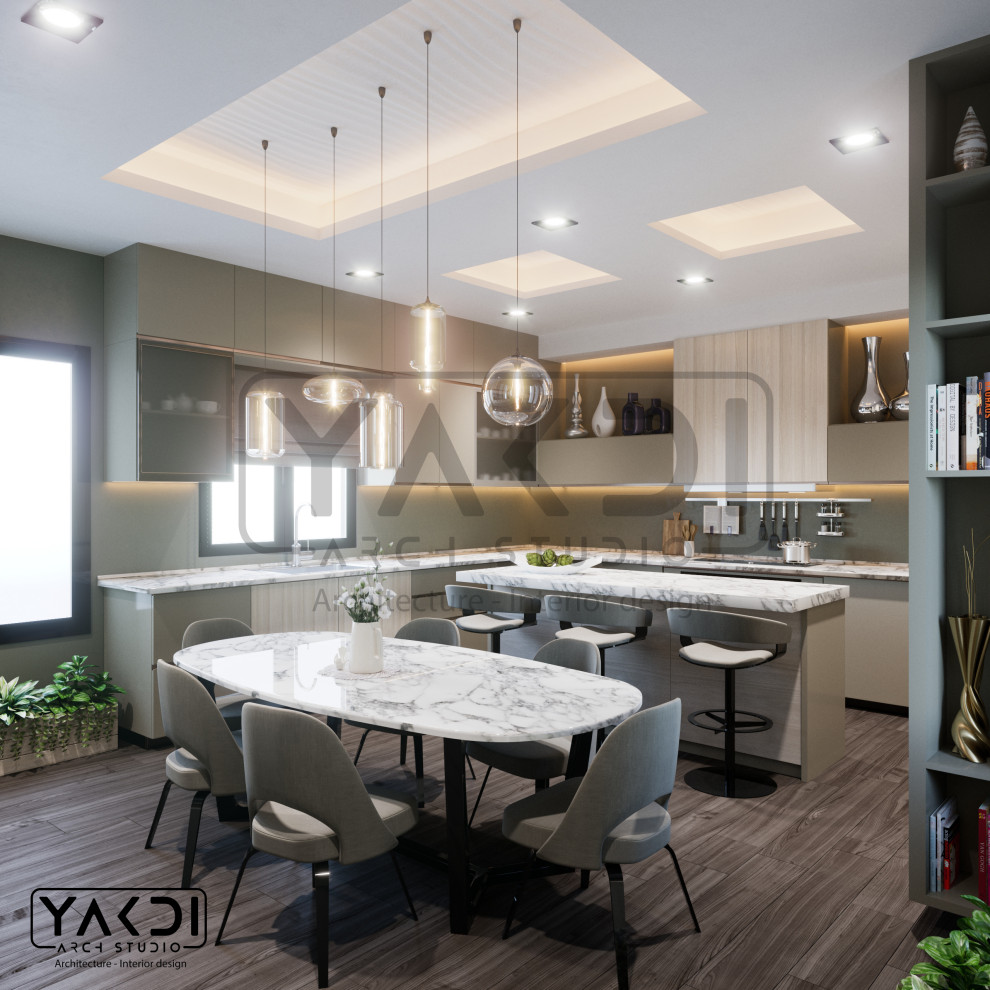 Example of a large minimalist u-shaped porcelain tile, brown floor and coffered ceiling eat-in kitchen design with a double-bowl sink, beaded inset cabinets, light wood cabinets, marble countertops, green backsplash, stone slab backsplash, stainless steel appliances, an island and white countertops