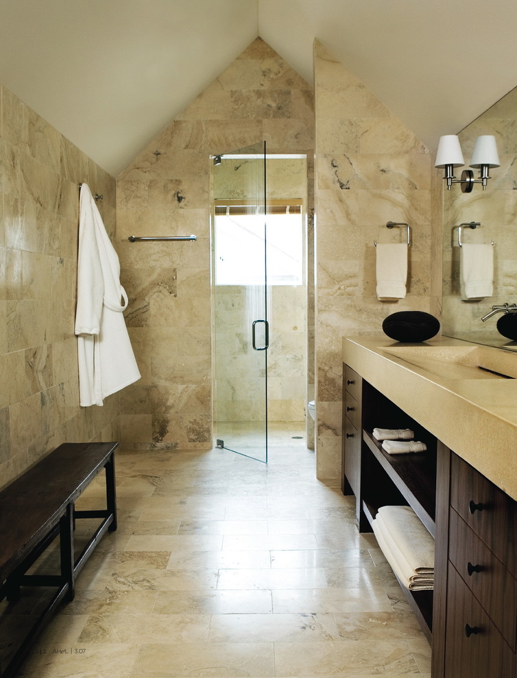 Inspiration for a contemporary bathroom in Atlanta with open cabinets, dark wood cabinets, an alcove shower, beige tile, an integrated sink and limestone.