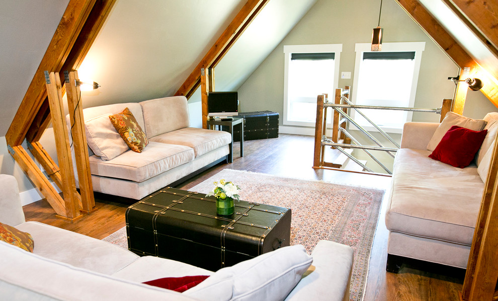 Small mountain style loft-style dark wood floor living room photo with gray walls, no fireplace and no tv