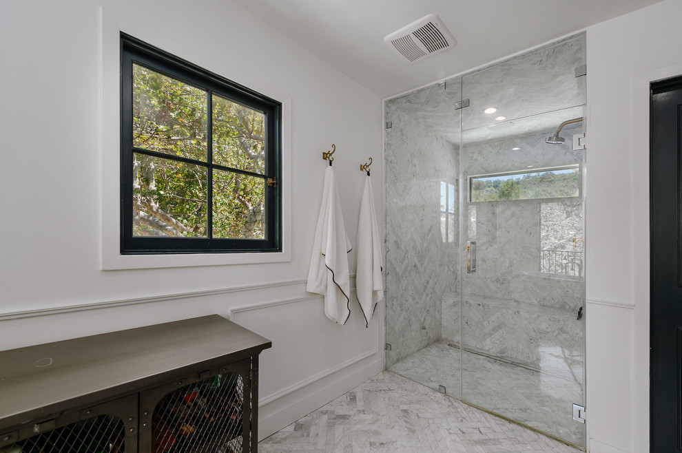This is an example of a large mediterranean master wet room bathroom in Other with open cabinets, a freestanding tub, white walls, a vessel sink and a hinged shower door.