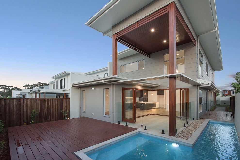 Photo of an asian home design in Sunshine Coast.