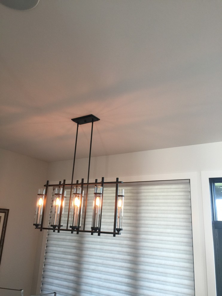 Transitional home design photo in Edmonton