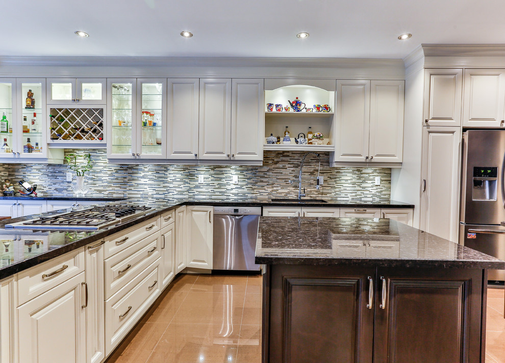 Example of a transitional kitchen design in Toronto