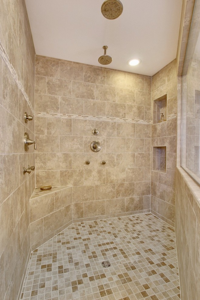 Large contemporary master bathroom in Other with an undermount sink, recessed-panel cabinets, dark wood cabinets, solid surface benchtops, a drop-in tub, a corner shower, a two-piece toilet, multi-coloured tile, ceramic tile, beige walls and ceramic floors.