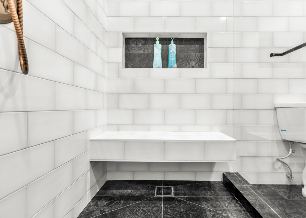 Photo of a large transitional master bathroom in Los Angeles with shaker cabinets, white cabinets, white tile, subway tile, white walls, porcelain floors and black floor.