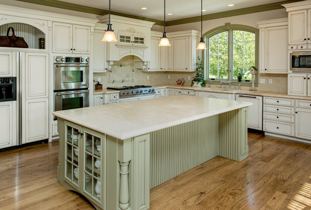 Design ideas for a transitional kitchen in Other with an undermount sink, raised-panel cabinets, white cabinets, panelled appliances and dark hardwood floors.