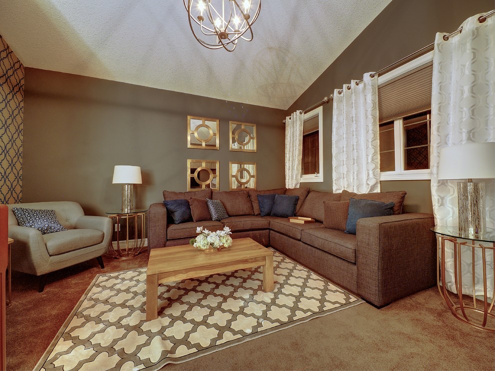 Example of a transitional home design design in Edmonton