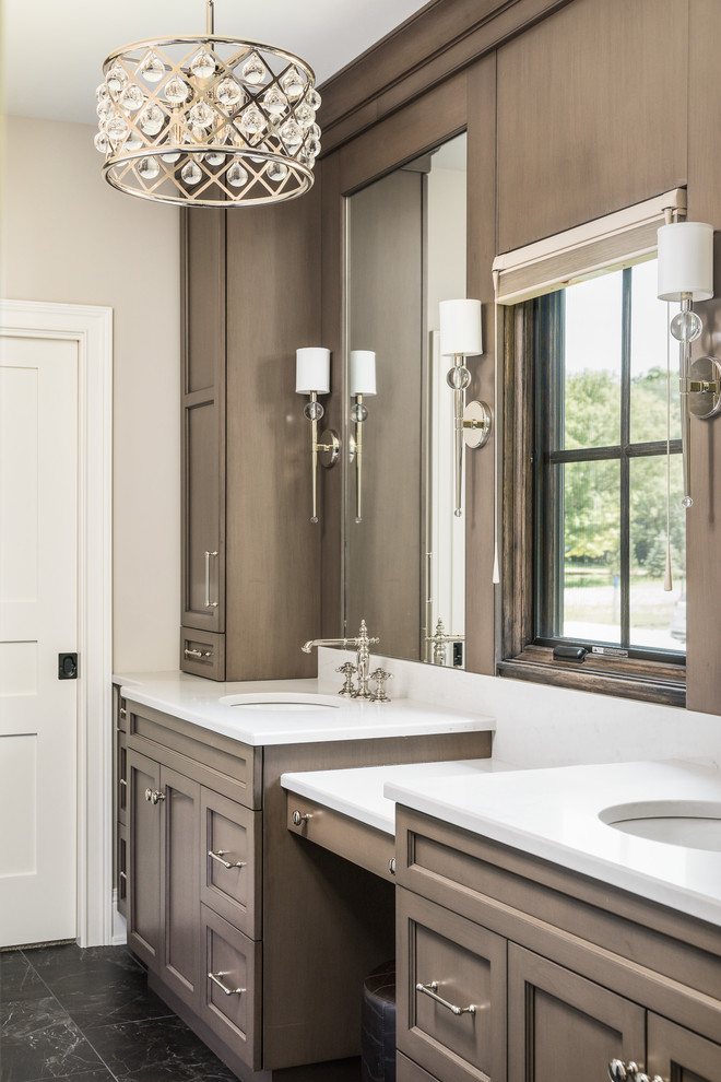 Design ideas for a large traditional master bathroom in Chicago with recessed-panel cabinets, brown cabinets, marble floors, an undermount sink, engineered quartz benchtops, black floor, white benchtops and beige walls.