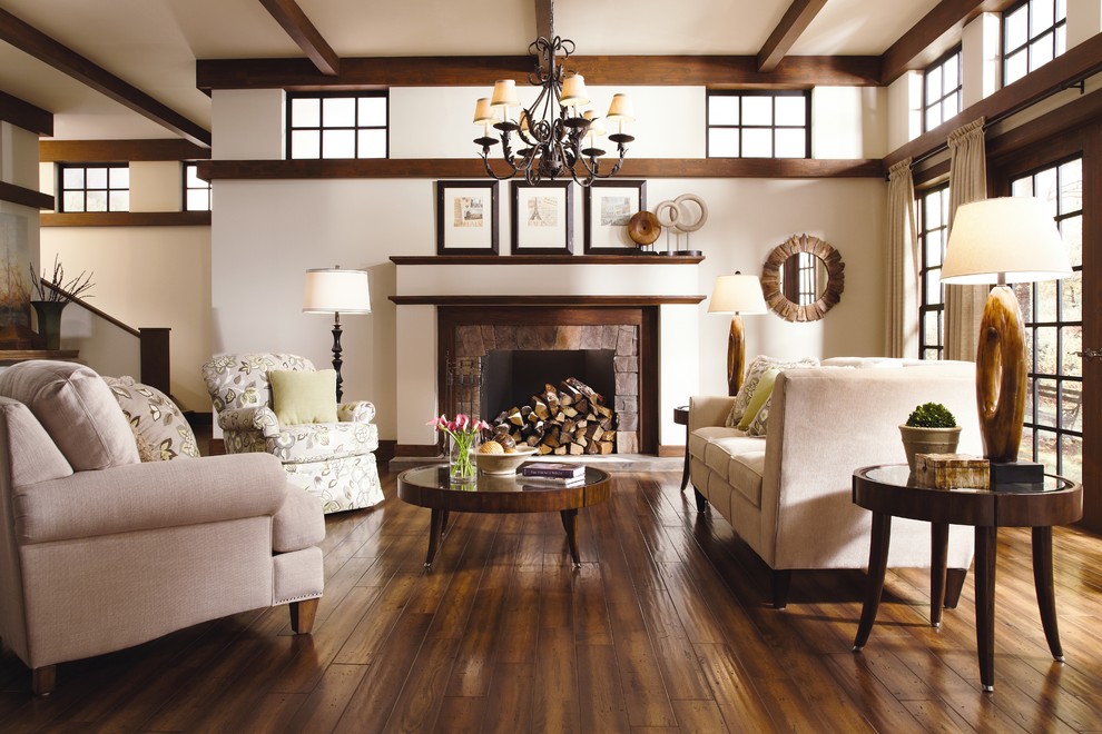 Inspiration for a transitional formal open concept living room in Milwaukee with dark hardwood floors, white walls, a standard fireplace, a stone fireplace surround and no tv.