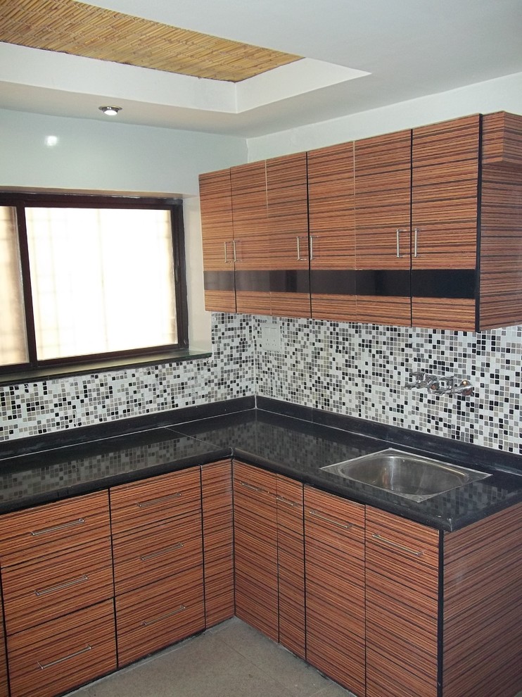 Example of an asian kitchen design in Other