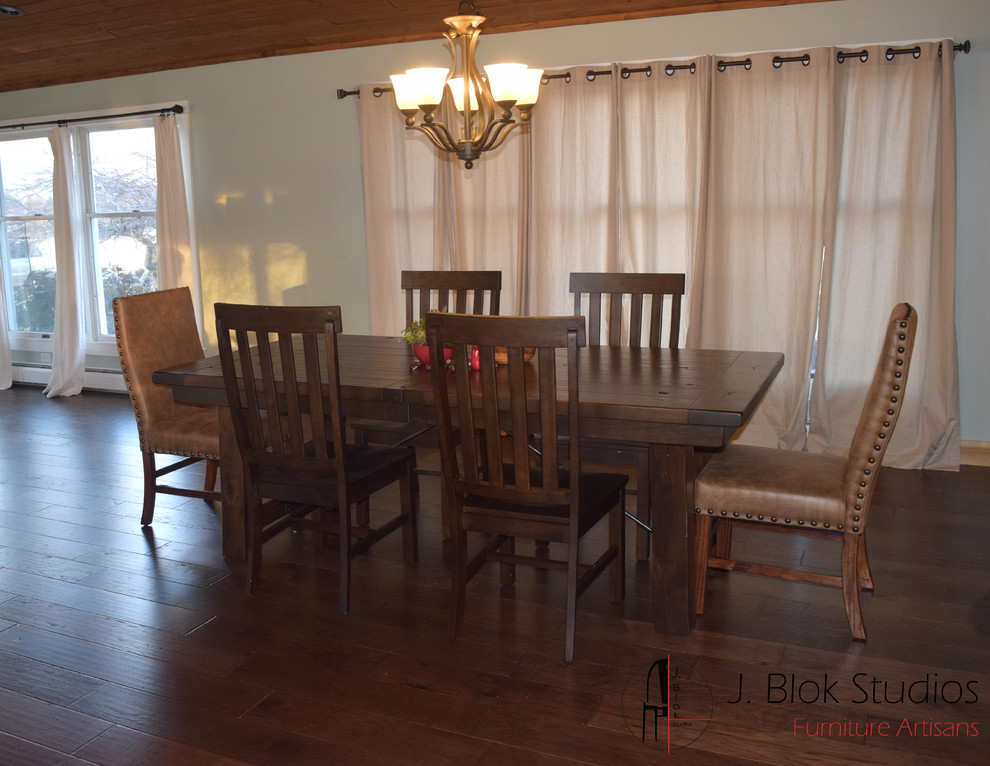 Dining room - rustic dining room idea in Grand Rapids