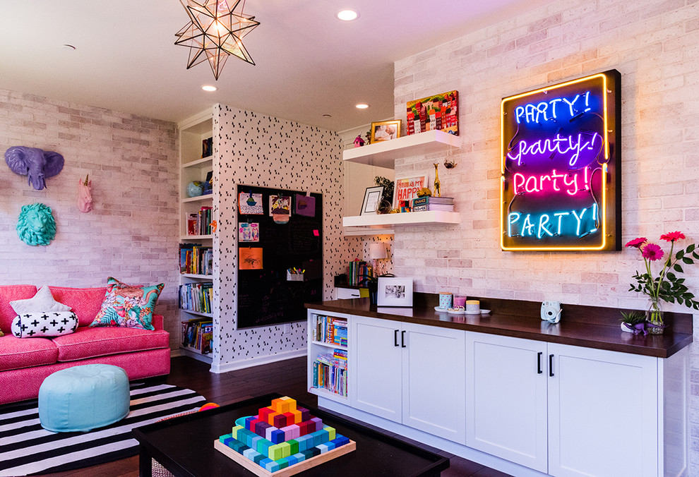 Inspiration for a mid-sized contemporary gender-neutral kids' playroom for kids 4-10 years old in Orange County with medium hardwood floors and brown floor.