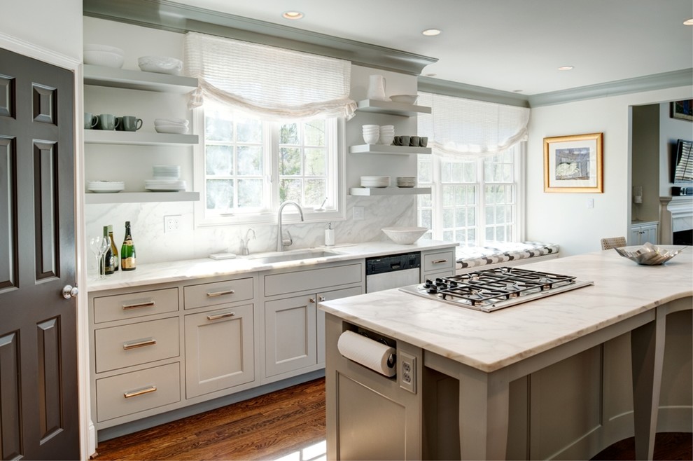 Example of a transitional medium tone wood floor kitchen design in Atlanta with recessed-panel cabinets, blue cabinets and an island