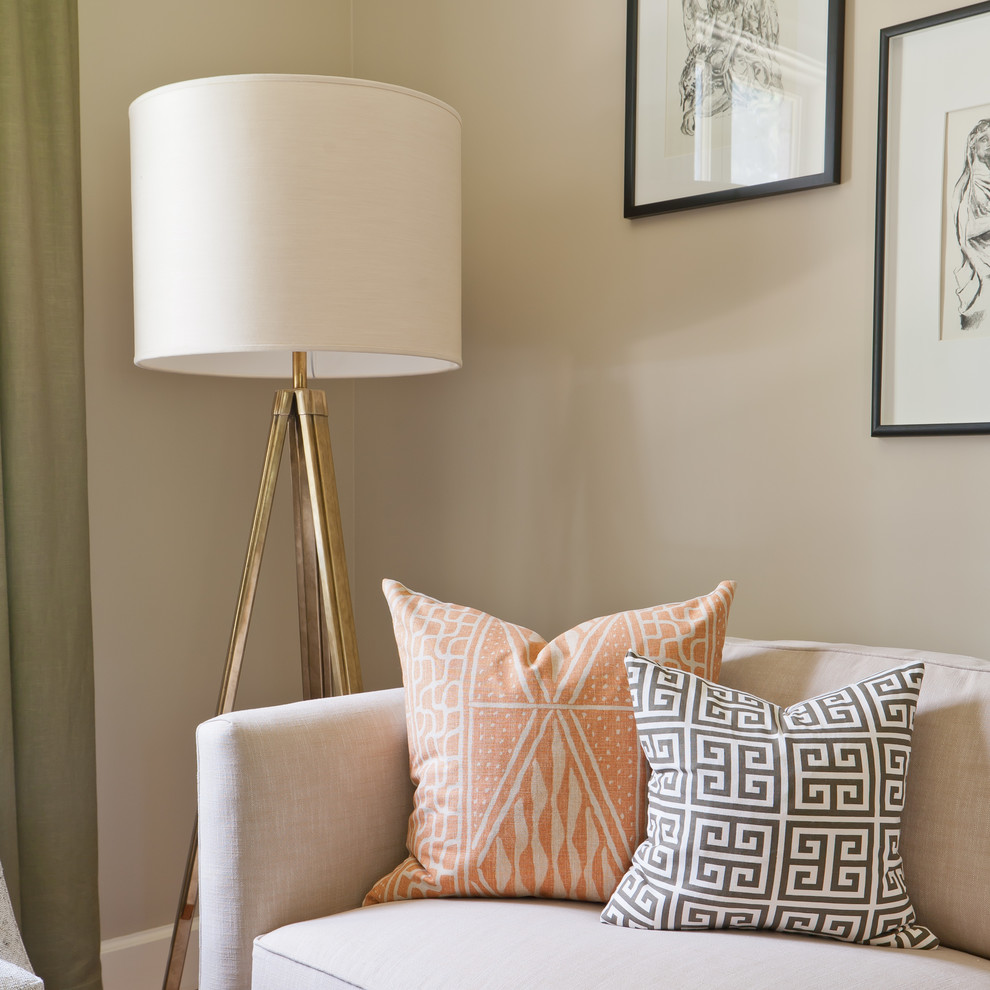 Small transitional enclosed living room in Atlanta with beige walls, medium hardwood floors and orange floor.