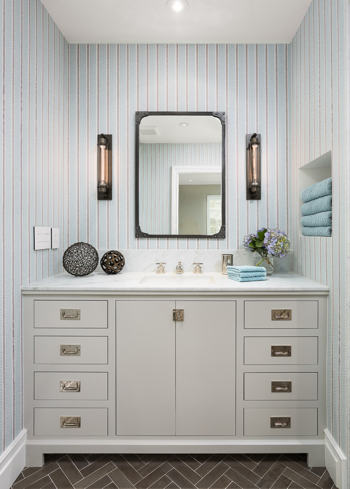 Inspiration for a small transitional kids bathroom in Los Angeles with an undermount sink, flat-panel cabinets, grey cabinets, marble benchtops, multi-coloured walls and limestone floors.