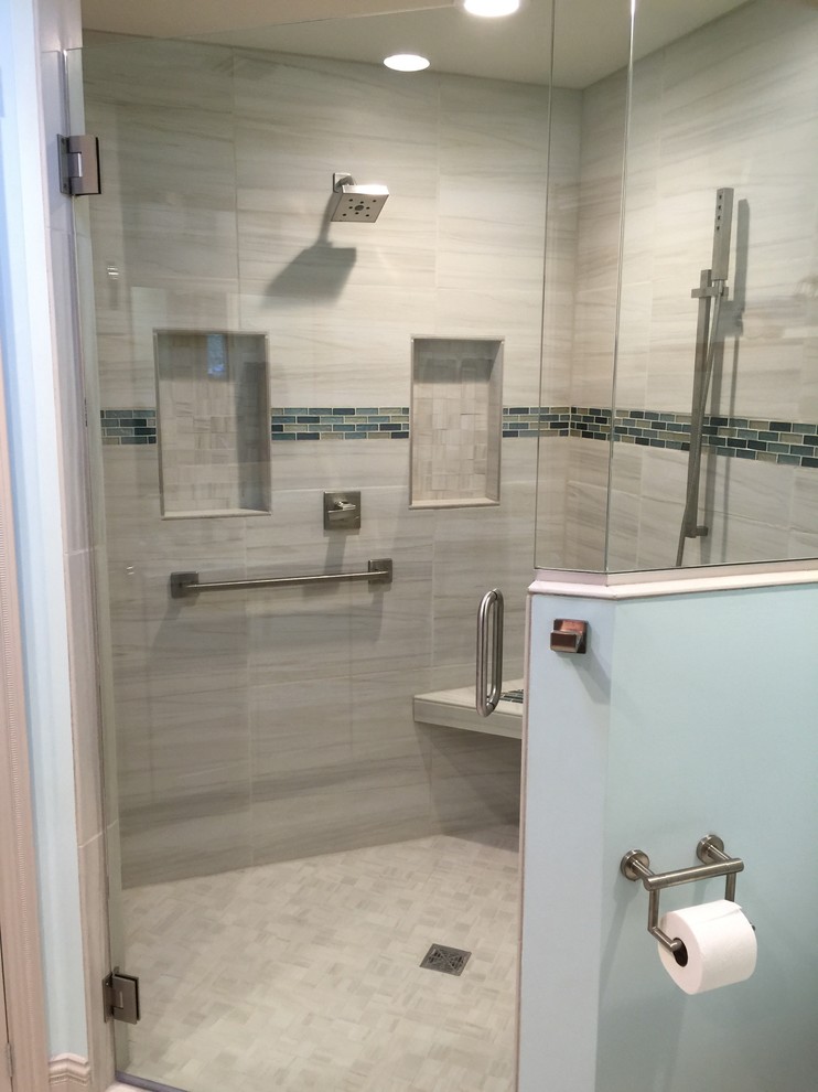 Mid-sized transitional gray tile and porcelain tile ceramic tile and gray floor walk-in shower photo in Phoenix with shaker cabinets, white cabinets, blue walls, an undermount sink, granite countertops and a hinged shower door