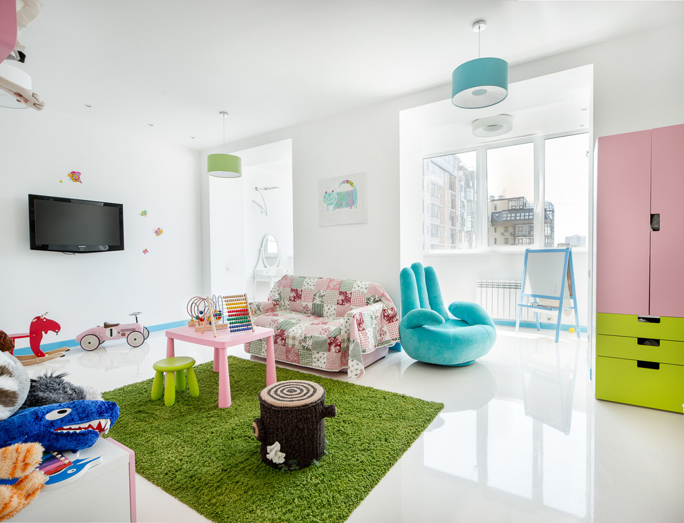 Large contemporary kids' playroom in Other with white walls for kids 4-10 years old and girls.