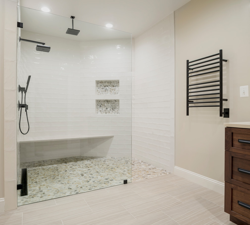 Transitional porcelain tile and beige floor walk-in shower photo in DC Metro with shaker cabinets, dark wood cabinets, beige walls, an undermount sink, quartz countertops and beige countertops