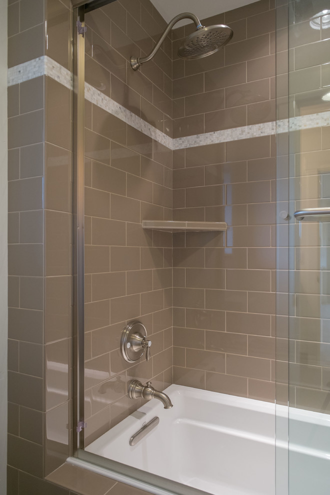 Mid-sized transitional kids' porcelain tile porcelain tile drop-in bathtub photo with an undermount sink, shaker cabinets and white cabinets