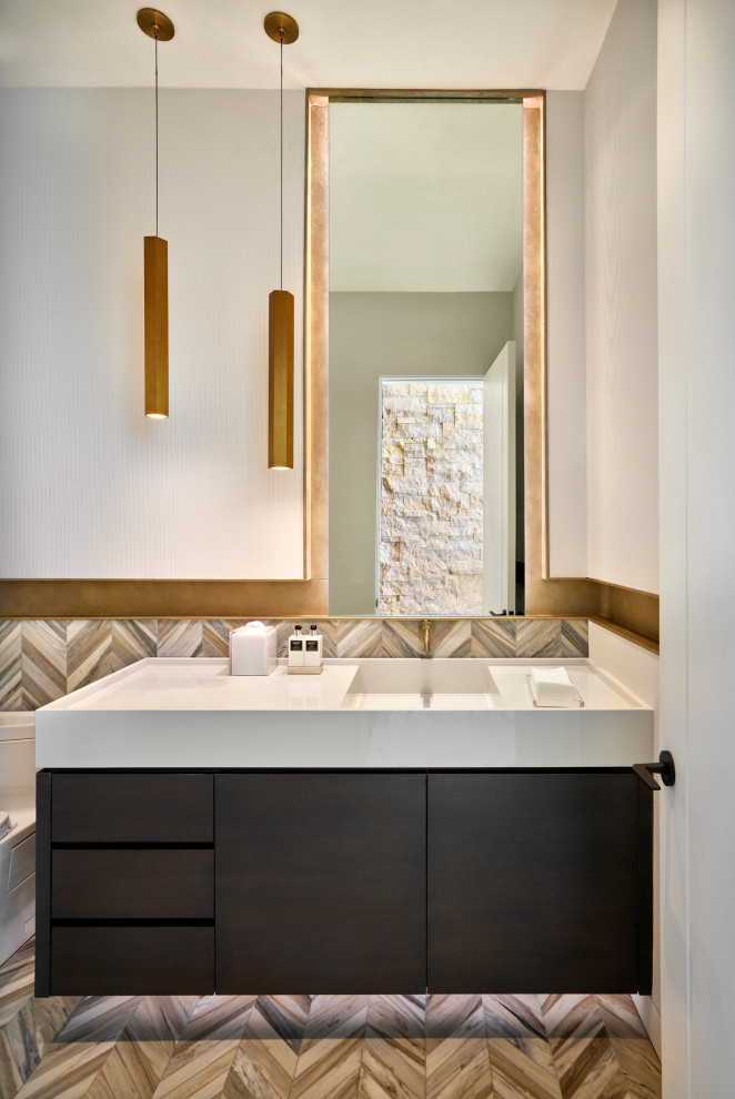 This is an example of a medium sized modern cloakroom in Phoenix with flat-panel cabinets, dark wood cabinets, a one-piece toilet, beige tiles, limestone tiles, white walls, limestone flooring, a console sink, beige floors, white worktops and a floating vanity unit.