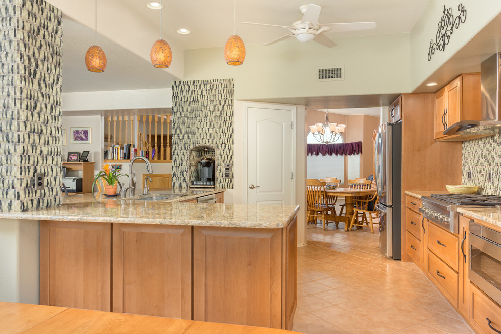 Open concept kitchen - mid-sized contemporary u-shaped porcelain tile open concept kitchen idea with an undermount sink, recessed-panel cabinets, light wood cabinets, granite countertops, multicolored backsplash, glass tile backsplash, stainless steel appliances and an island