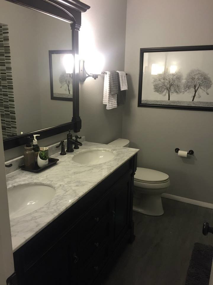 Inspiration for a transitional bathroom remodel in Phoenix with marble countertops