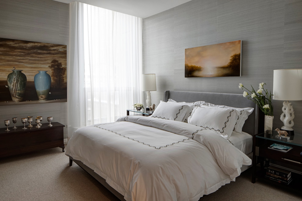 Inspiration for a transitional bedroom in Chicago with grey walls and carpet.