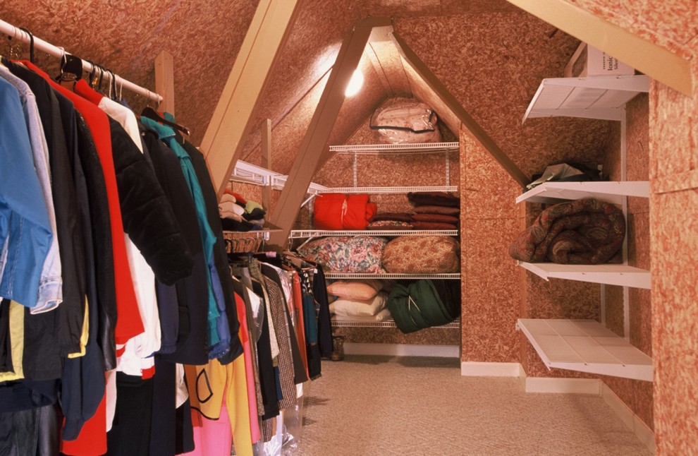 Walk-in closet - mid-sized traditional gender-neutral carpeted walk-in closet idea in Atlanta with open cabinets and white cabinets