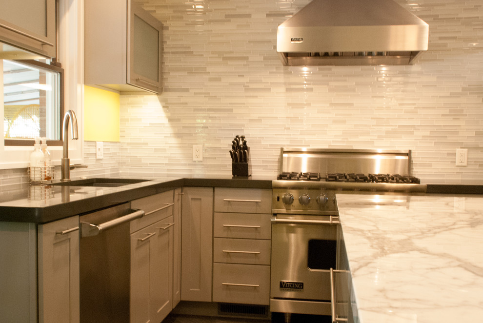 Example of a transitional kitchen design in New York