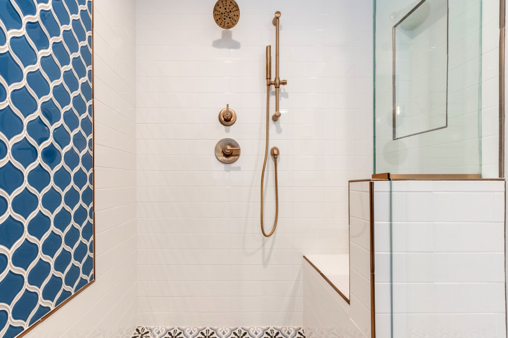 This is an example of a large midcentury master bathroom in Seattle with shaker cabinets, blue cabinets, a freestanding tub, white tile, subway tile, white walls, cement tiles, quartzite benchtops, a hinged shower door and white benchtops.