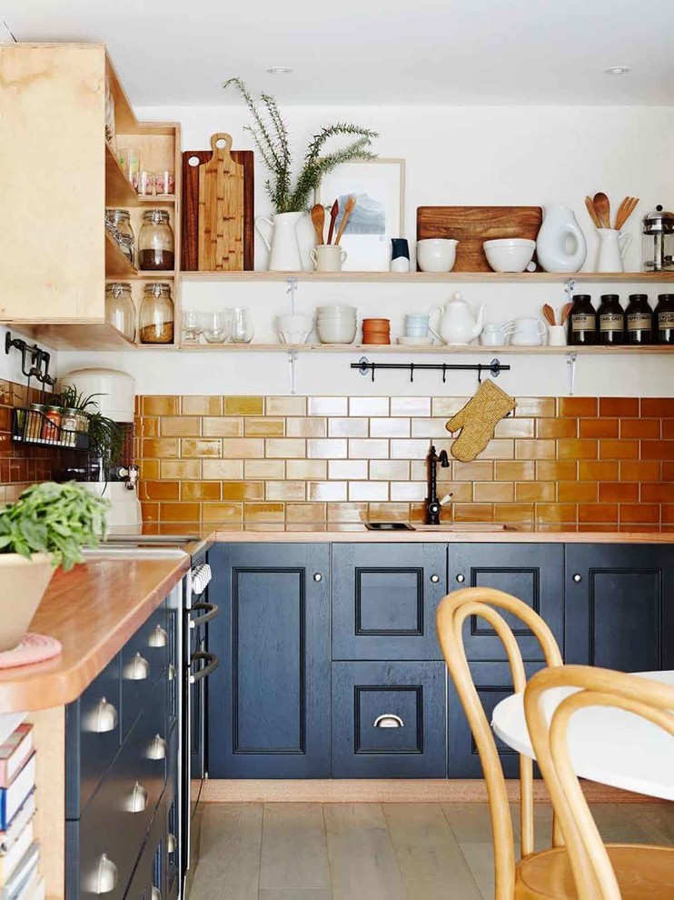 Photo of an eclectic kitchen in Melbourne.