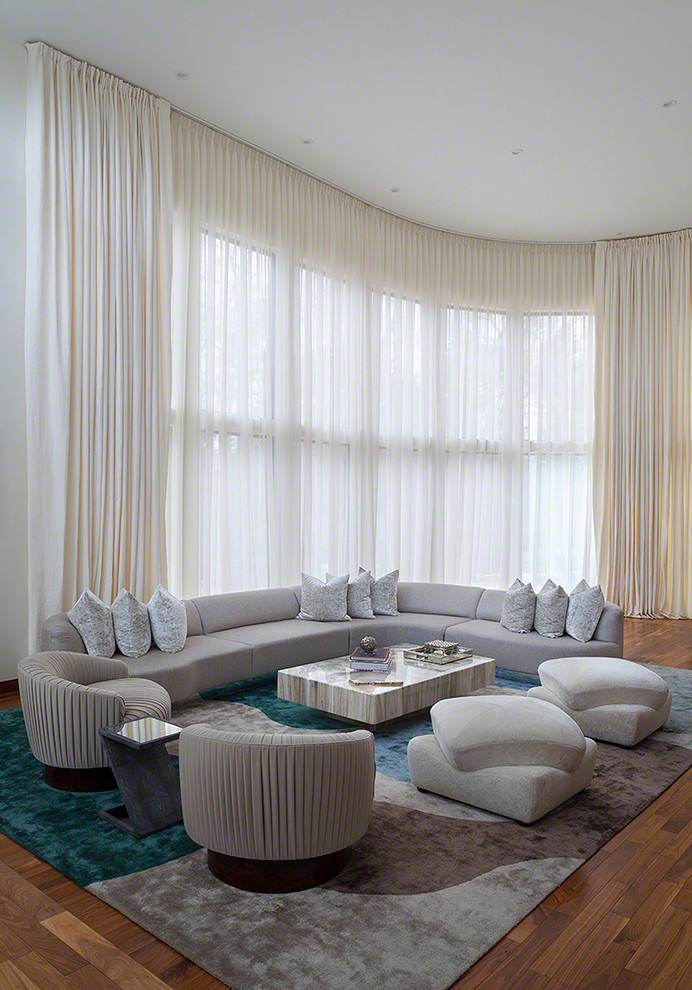 Inspiration for an expansive contemporary living room in New York with white walls, no fireplace and no tv.