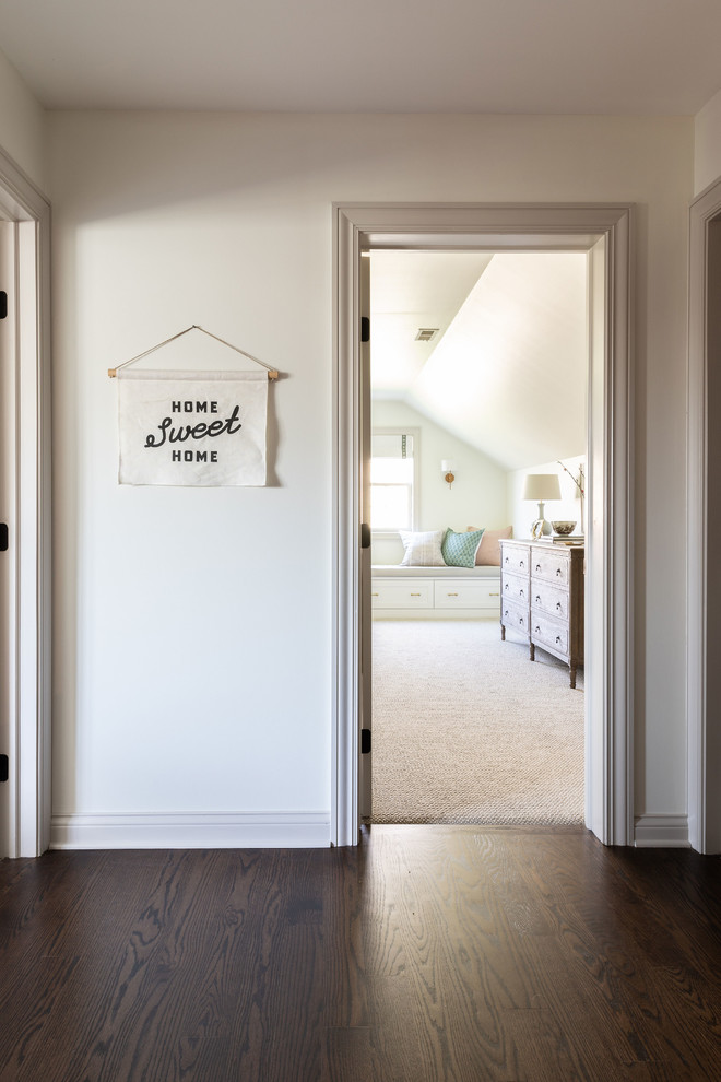 Derby House Kids Wing - Hallway remodel including new flooring, trim, doors, & paint. Photo by Emily Kennedy Photography.