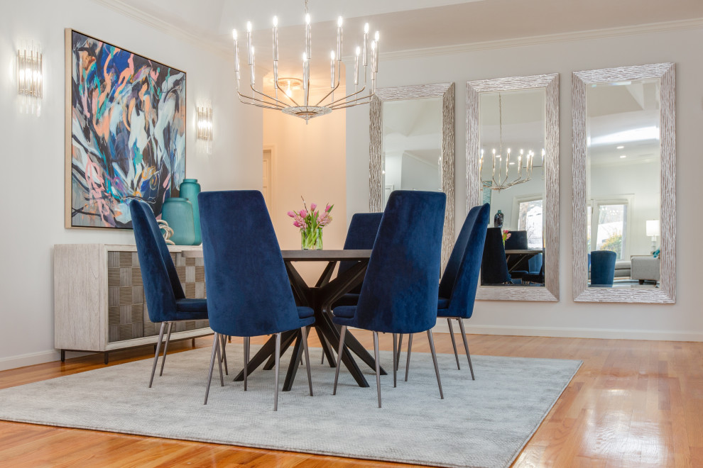 This is an example of a contemporary dining room in Boston.