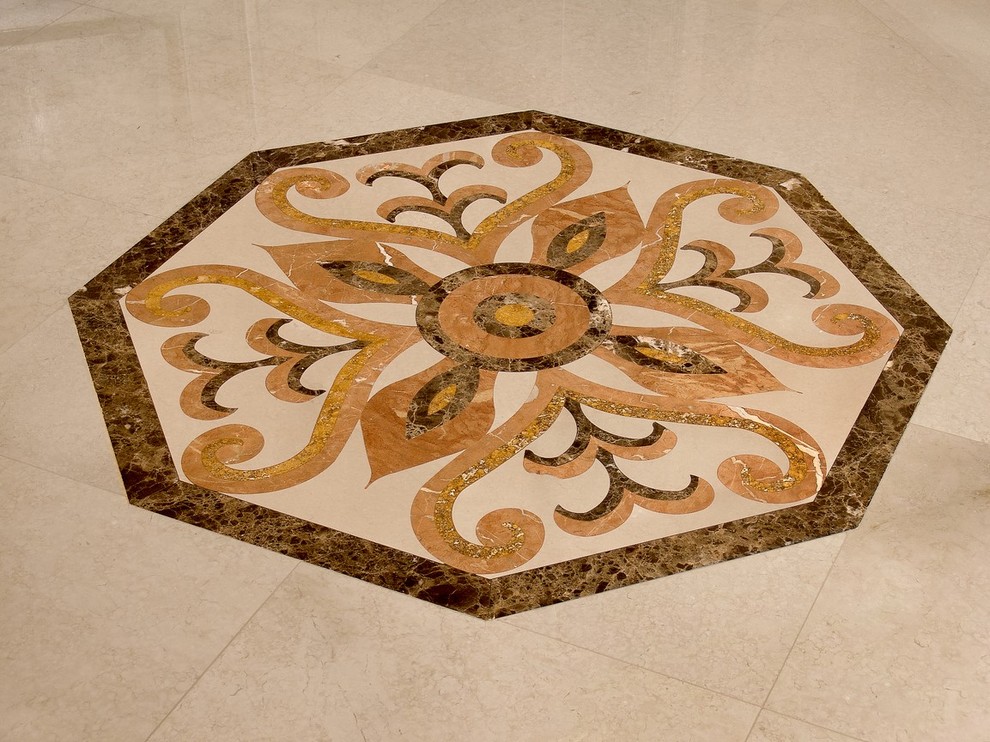 Photo of a traditional entryway in Miami with granite floors.