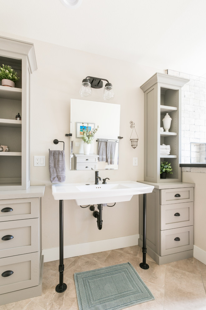 Design ideas for a country bathroom in Santa Barbara with a curbless shower and a wall-mount sink.