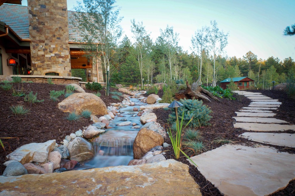 Photo of a rustic landscaping in Denver.