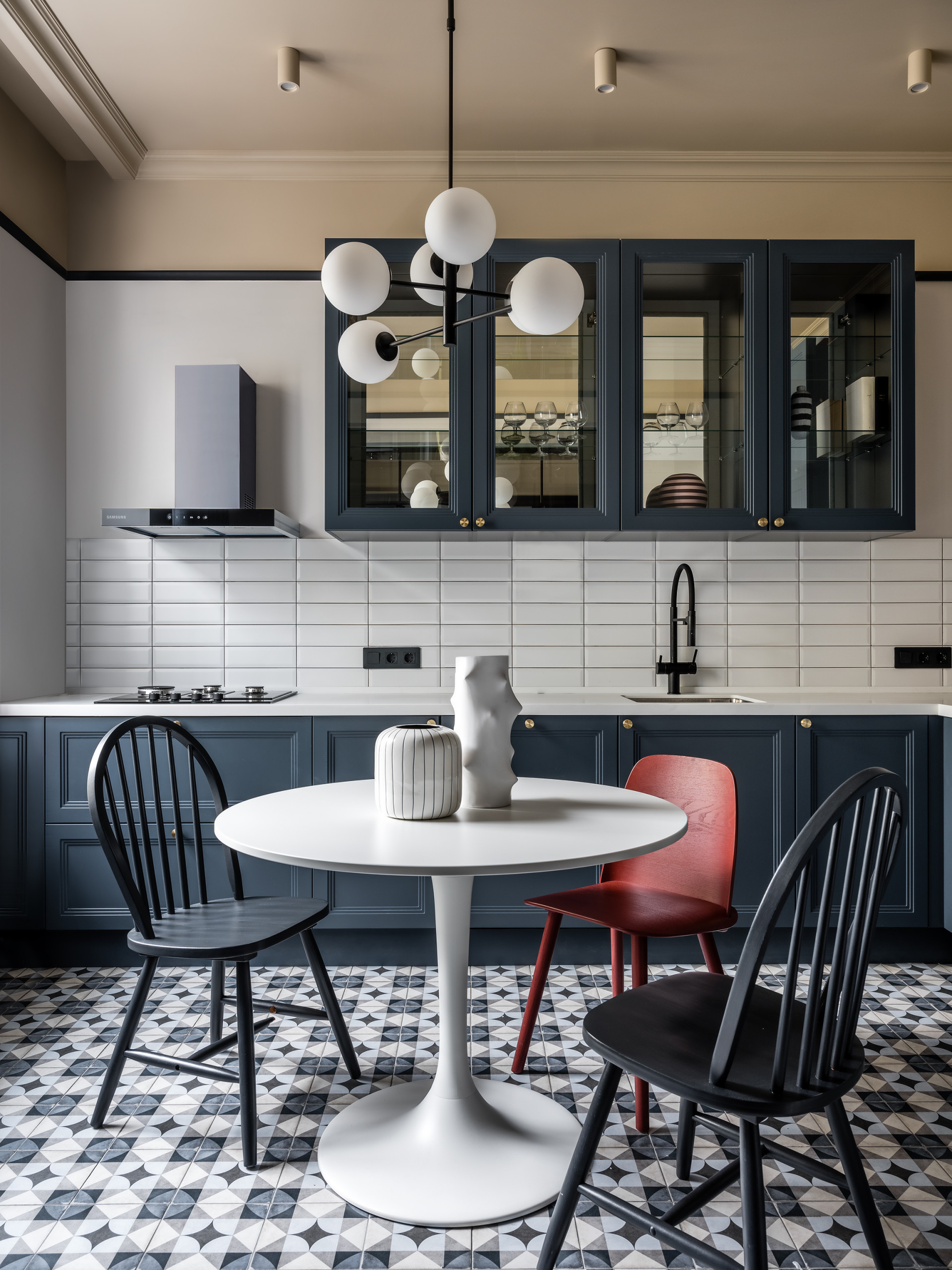 Kitchen Details: Brushed Brass Cabinet Pulls Against Light Blue