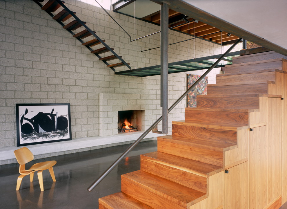 This is an example of an industrial wood staircase in Los Angeles with wood risers.