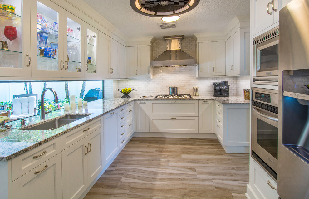 Design ideas for a transitional kitchen in Tampa.