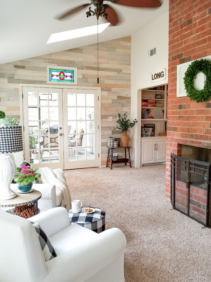 Mid-sized country sunroom in Other with carpet, a standard fireplace, a brick fireplace surround, a standard ceiling and beige floor.