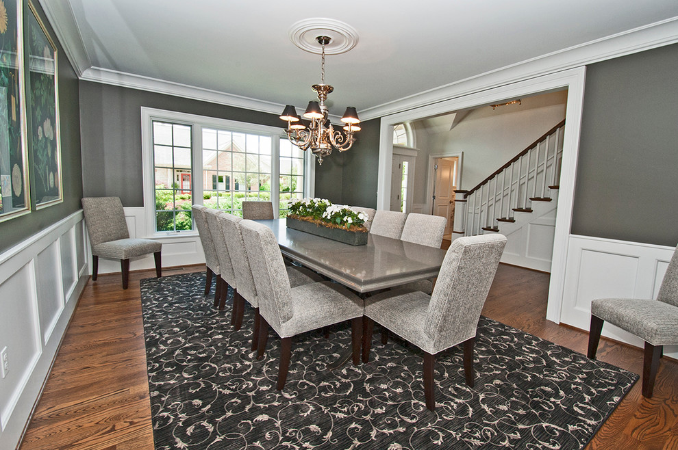 Design ideas for a large transitional separate dining room in Other with grey walls, medium hardwood floors, no fireplace and brown floor.