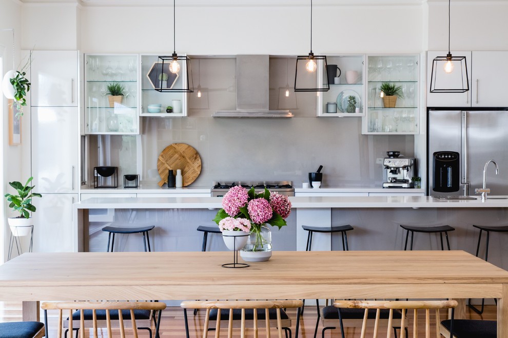 Inspiration for a large scandinavian kitchen in Melbourne with medium hardwood floors.