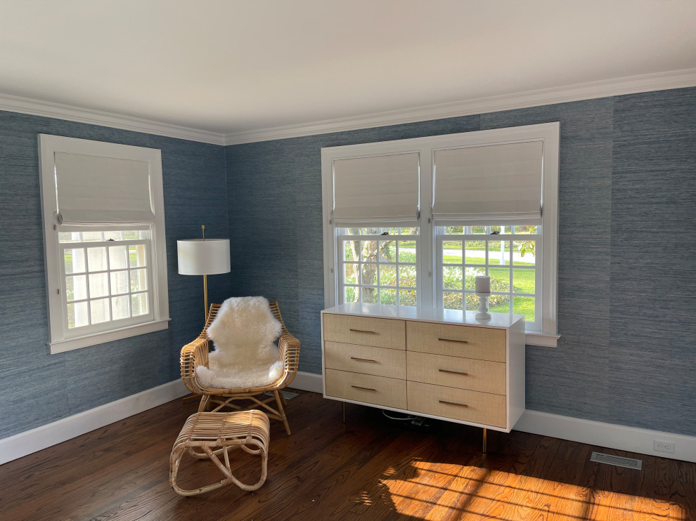 Medium sized beach style guest bedroom in New York with blue walls, medium hardwood flooring, brown floors, a drop ceiling and wallpapered walls.