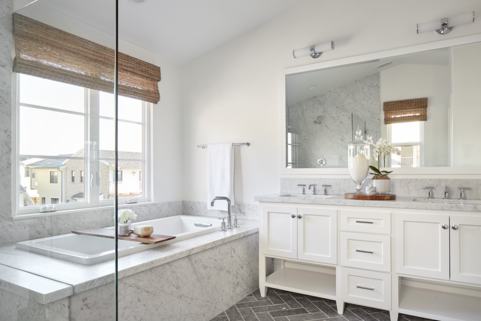 Inspiration for a transitional bathroom in San Francisco with shaker cabinets, white cabinets, a drop-in tub, white walls, an undermount sink, grey floor, grey benchtops, a double vanity and a freestanding vanity.