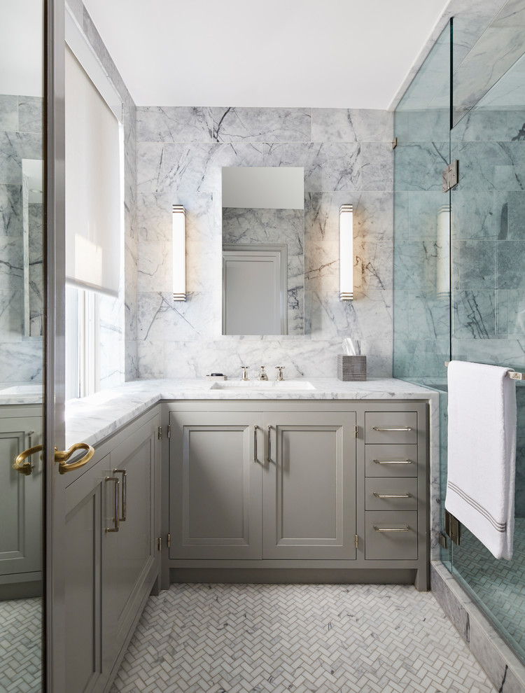 Photo of a small traditional bathroom in Chicago with shaker cabinets, grey cabinets, marble, marble floors, an integrated sink, marble benchtops and a hinged shower door.