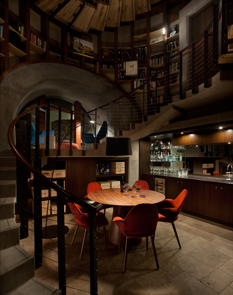 This is an example of a modern wine cellar in San Diego with grey floor.