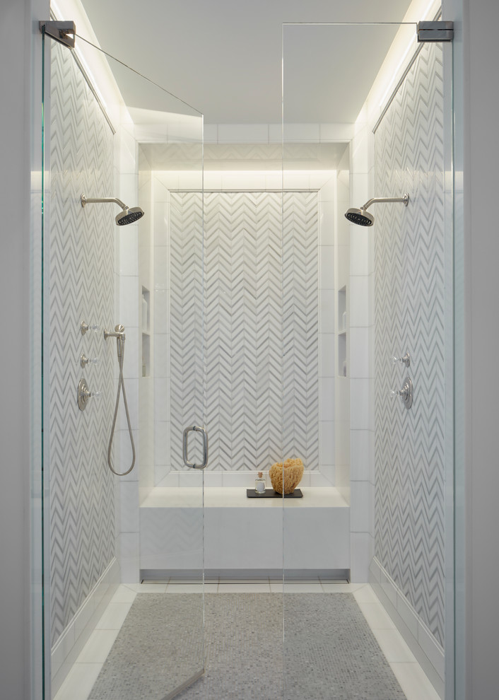 Photo of an expansive traditional master bathroom in Chicago with a curbless shower, stone tile, marble floors, an undermount sink, grey floor and a hinged shower door.